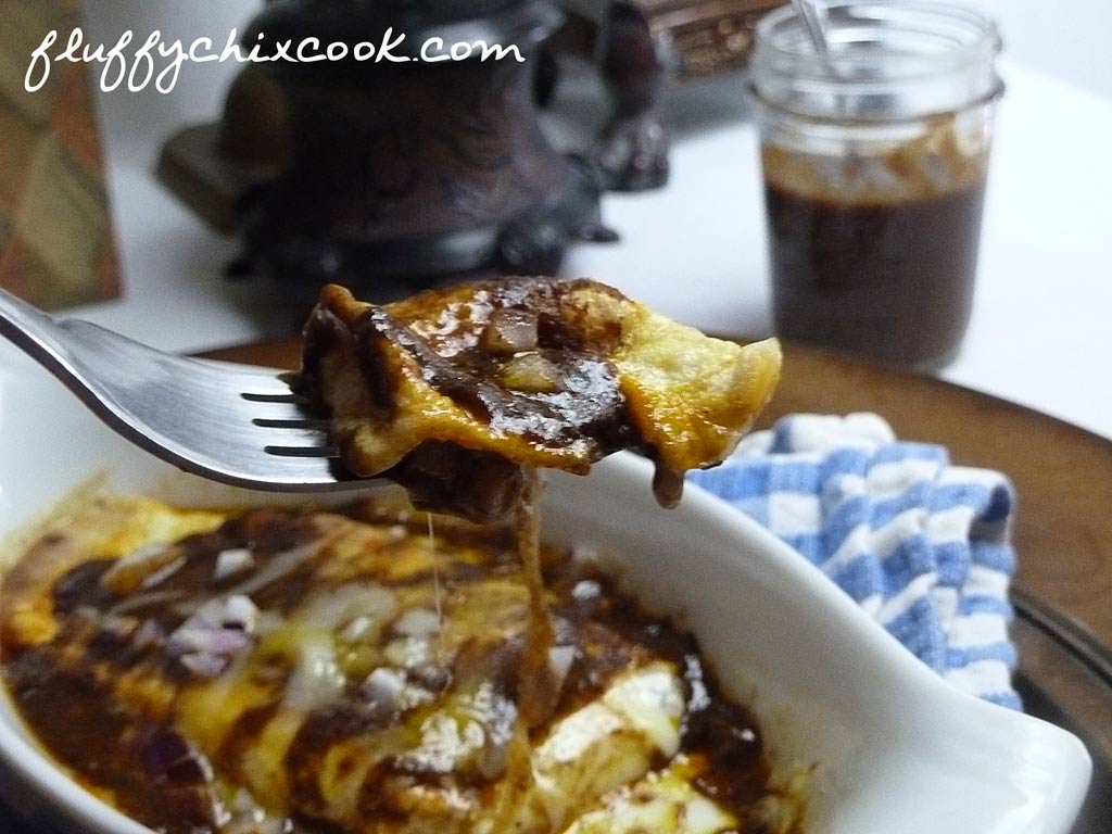Bite of Low Carb Cheese Enchilada with Low Carb Chili Gravy